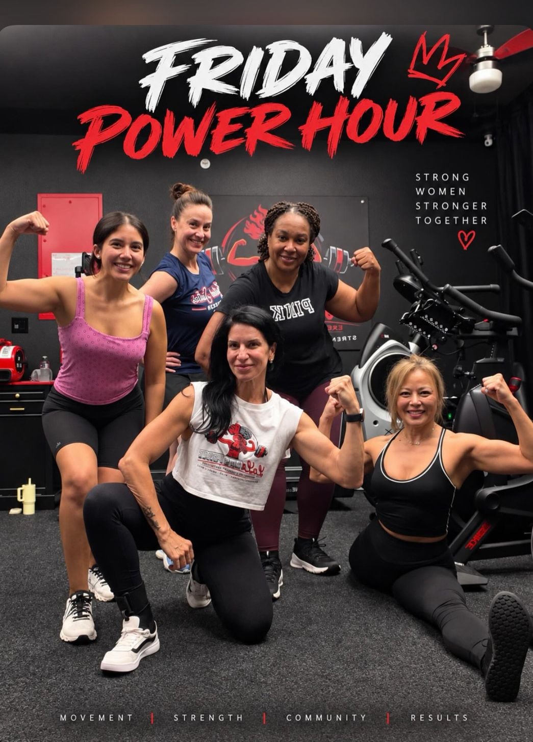 Five women flexing and smiling together after a Lala Life Force group training session.